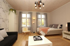 Idyllic central wooden house apartment in Pori